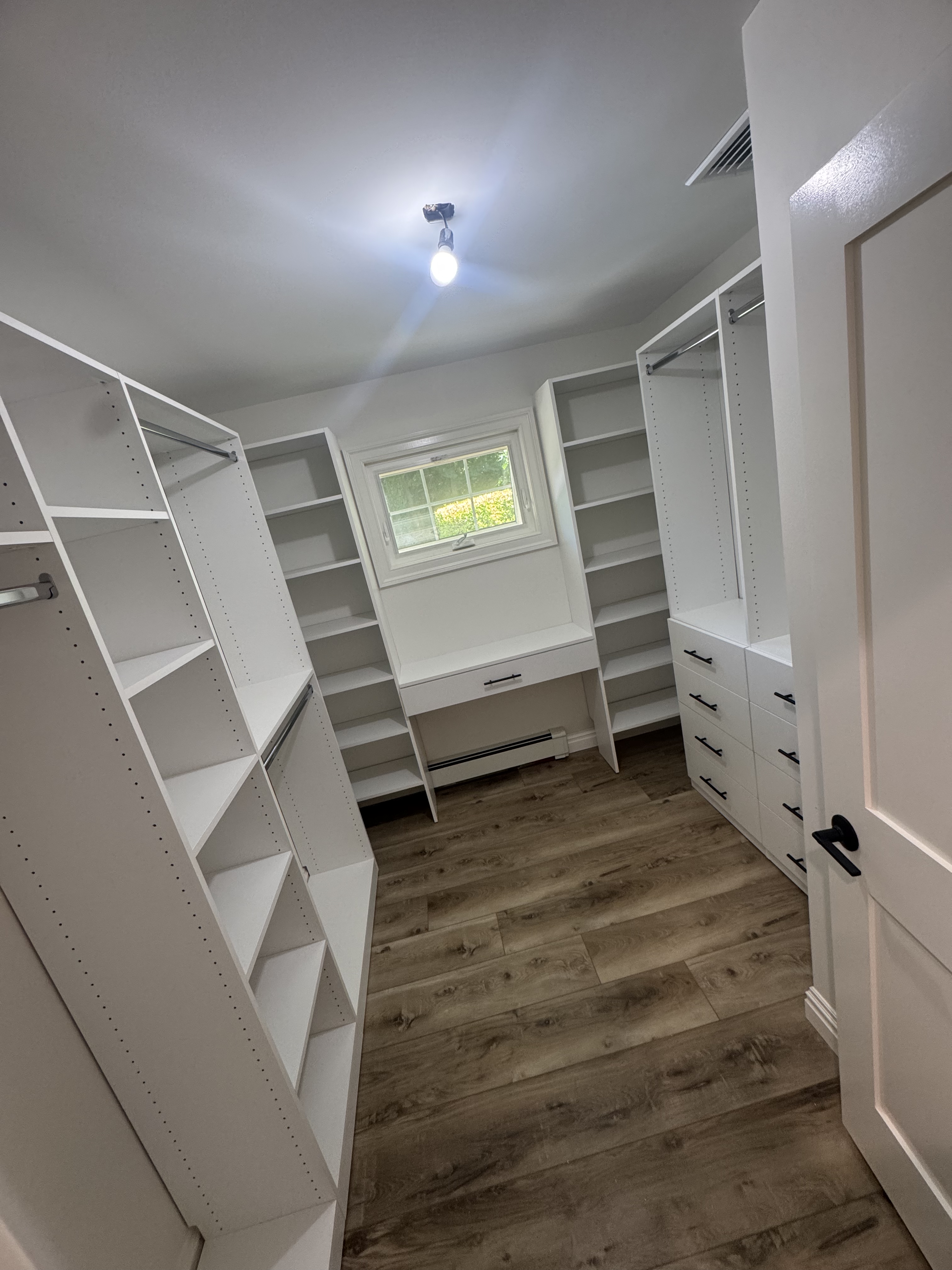 Big Walk-In custom closet project by Captain Chris's Closets on Long Island