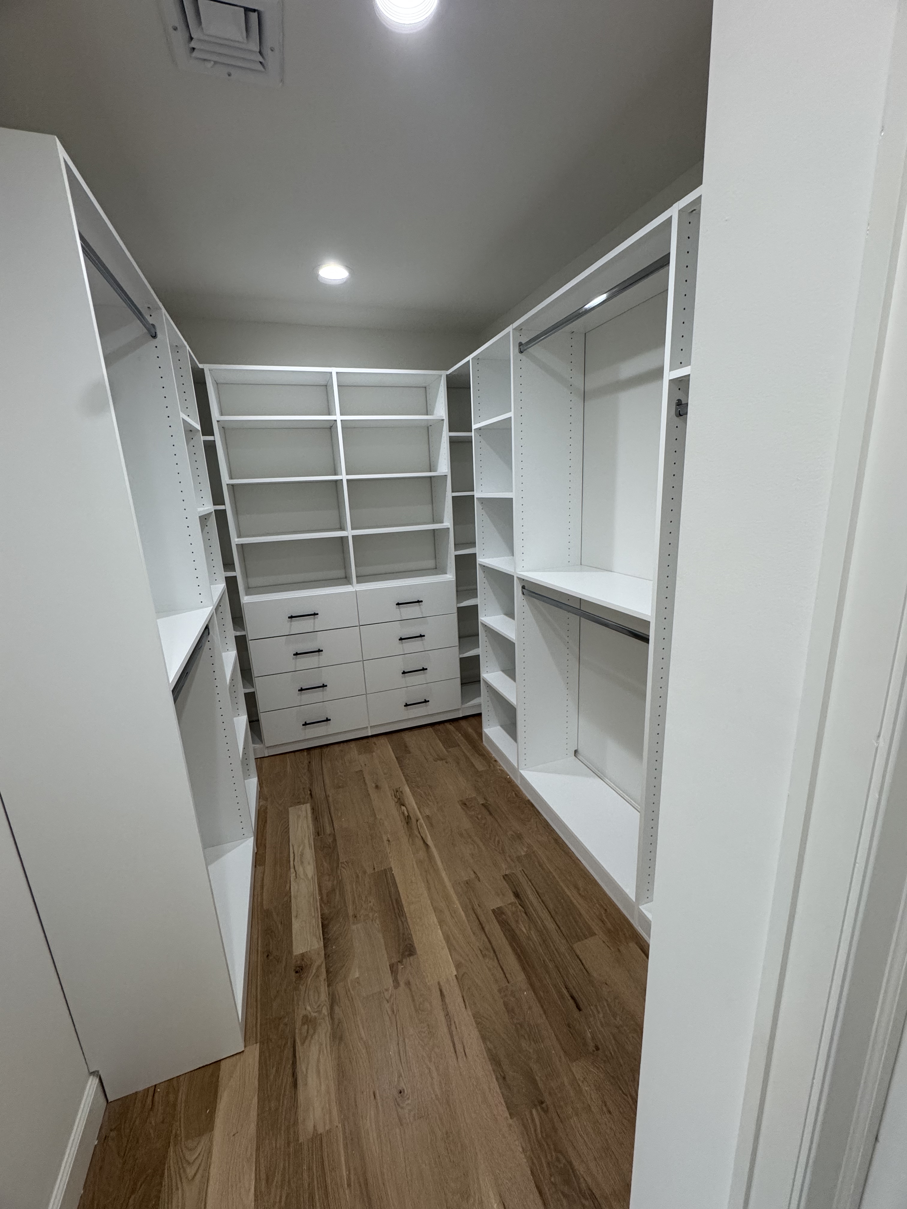Big Walk-In custom closet project by Captain Chris's Closets on Long Island