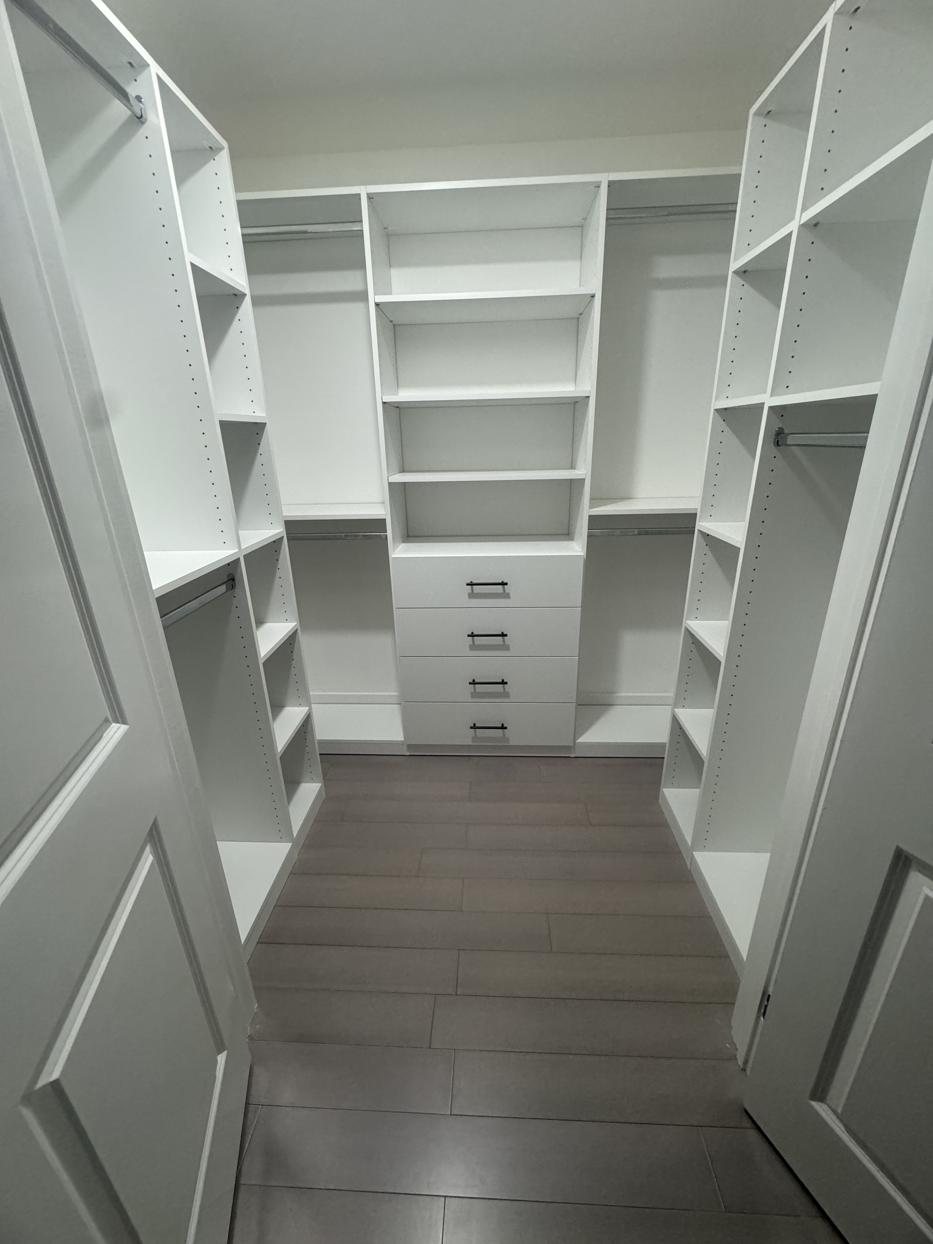 Big Walk-In custom closet project by Captain Chris's Closets on Long Island