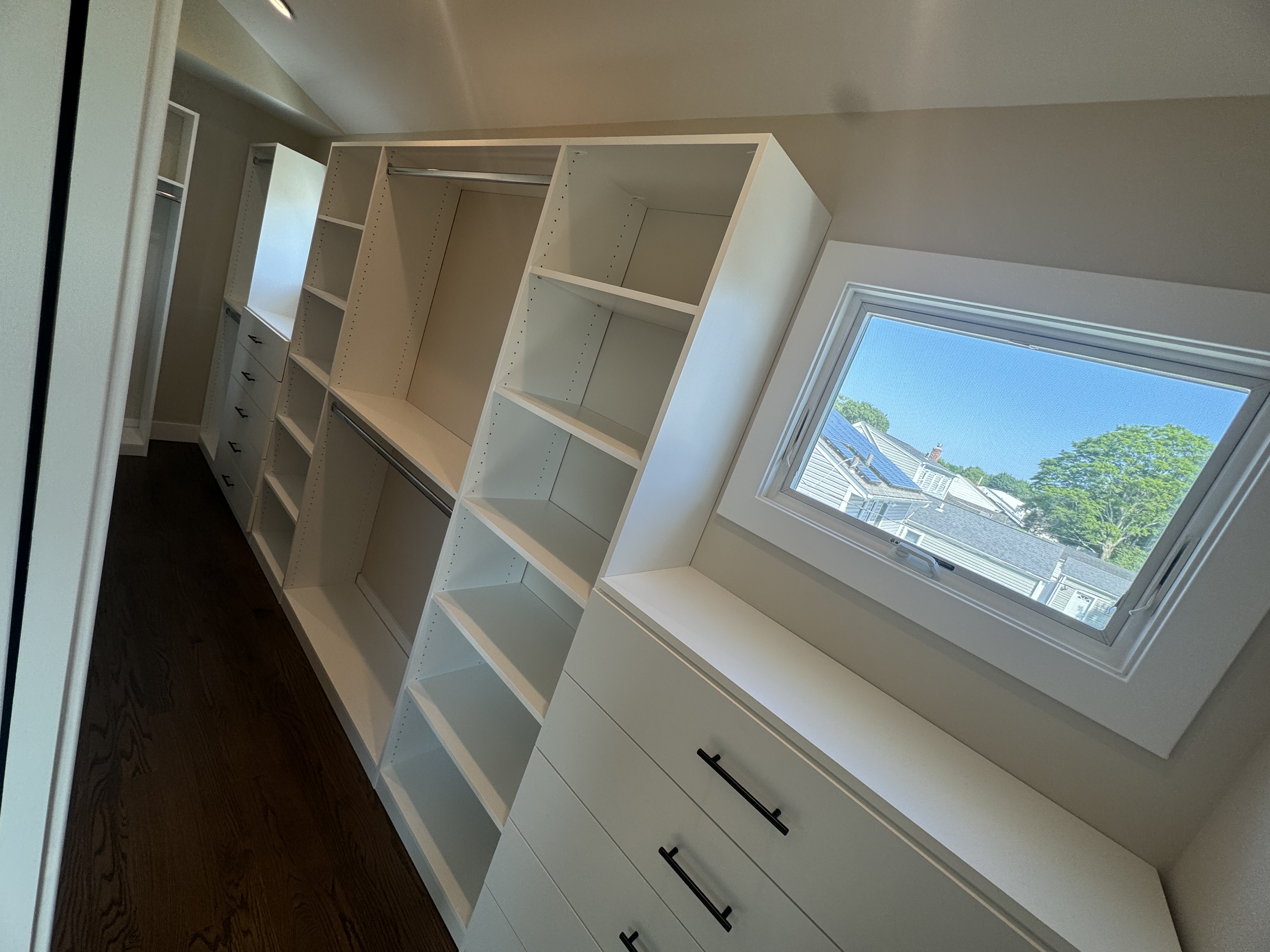 Big Walk-In custom closet project by Captain Chris's Closets on Long Island