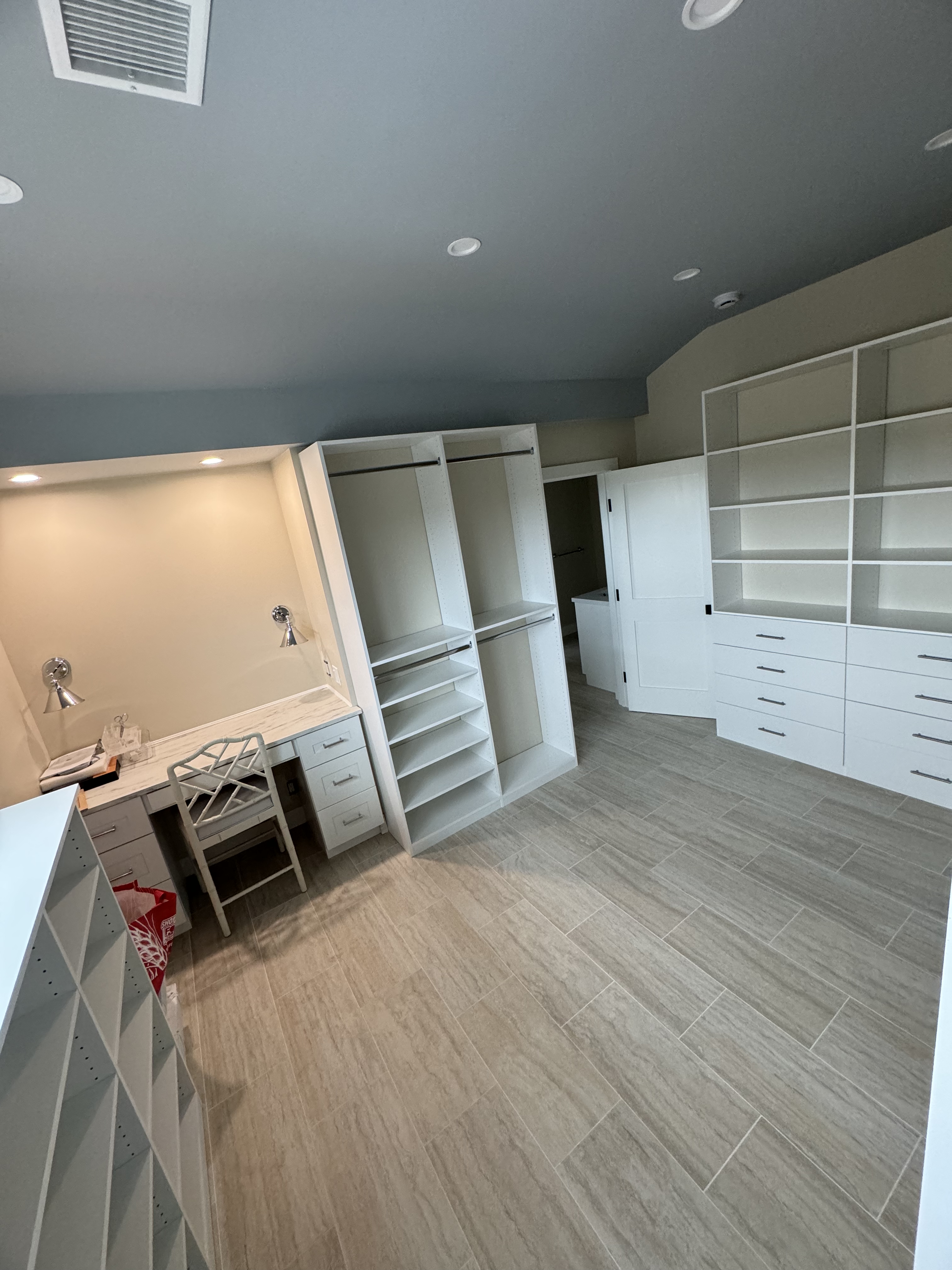 Big Walk-In custom closet project by Captain Chris's Closets on Long Island