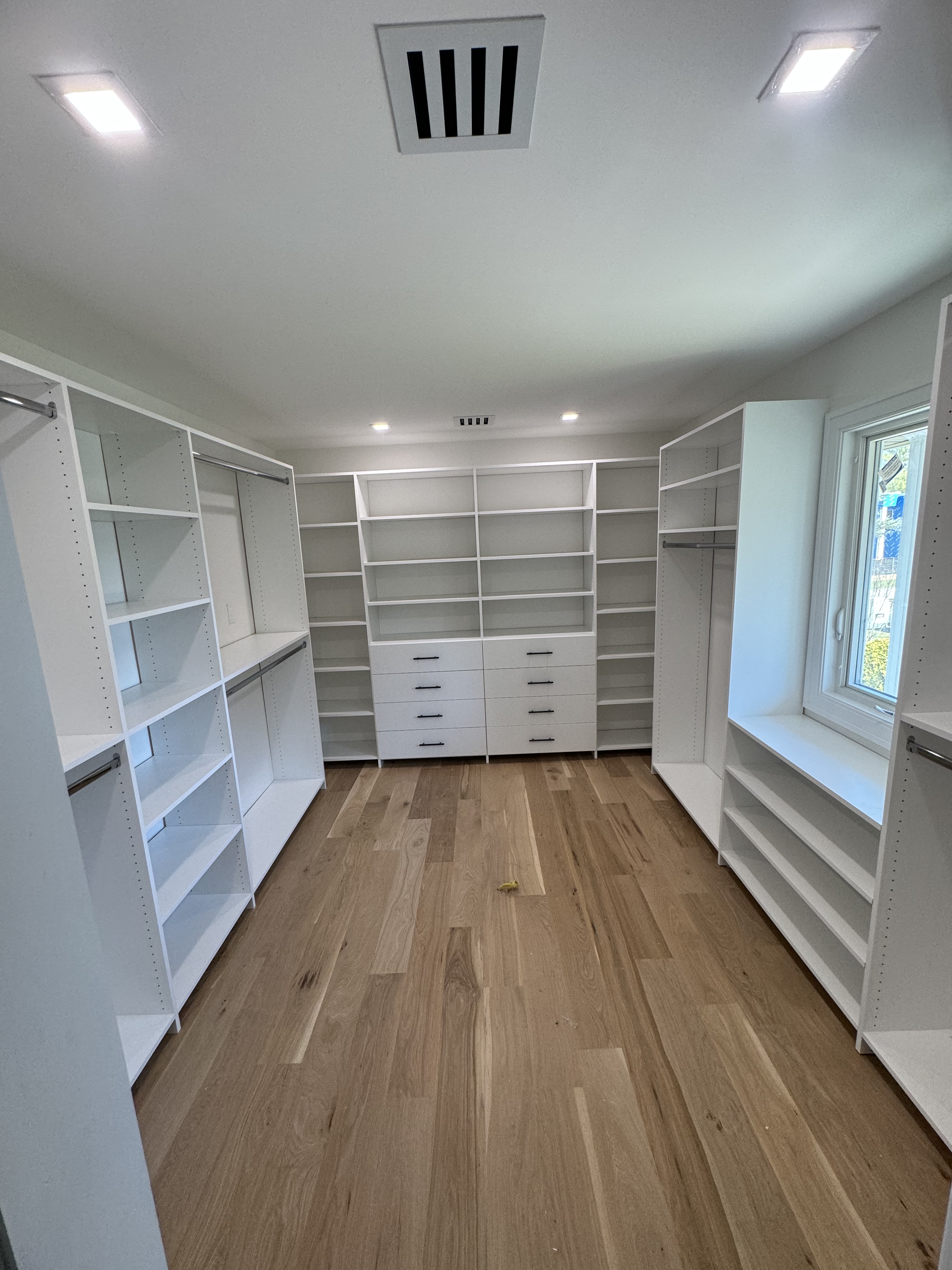 Big Walk-In custom closet project by Captain Chris's Closets on Long Island