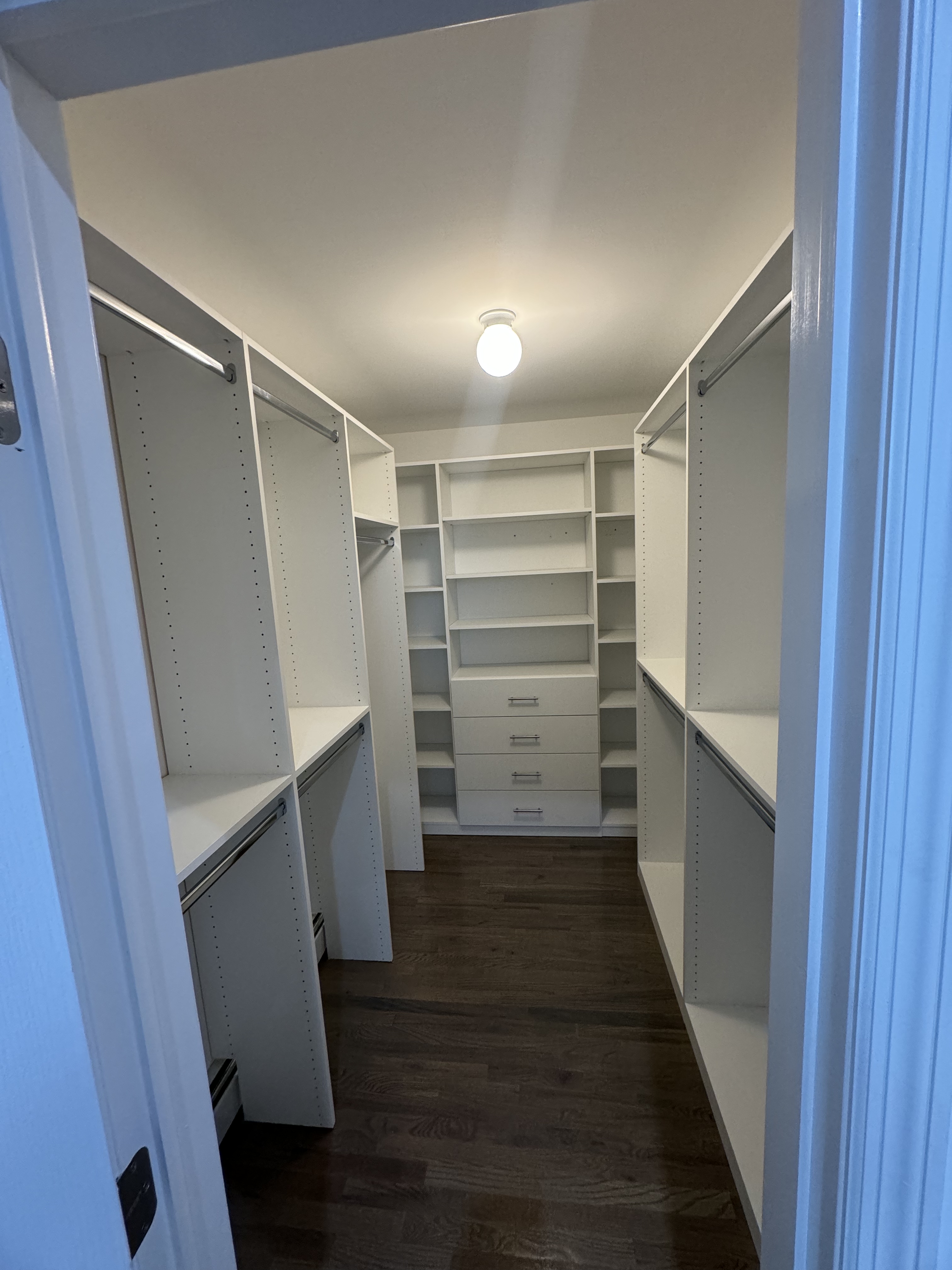 Big Walk-In custom closet project by Captain Chris's Closets on Long Island