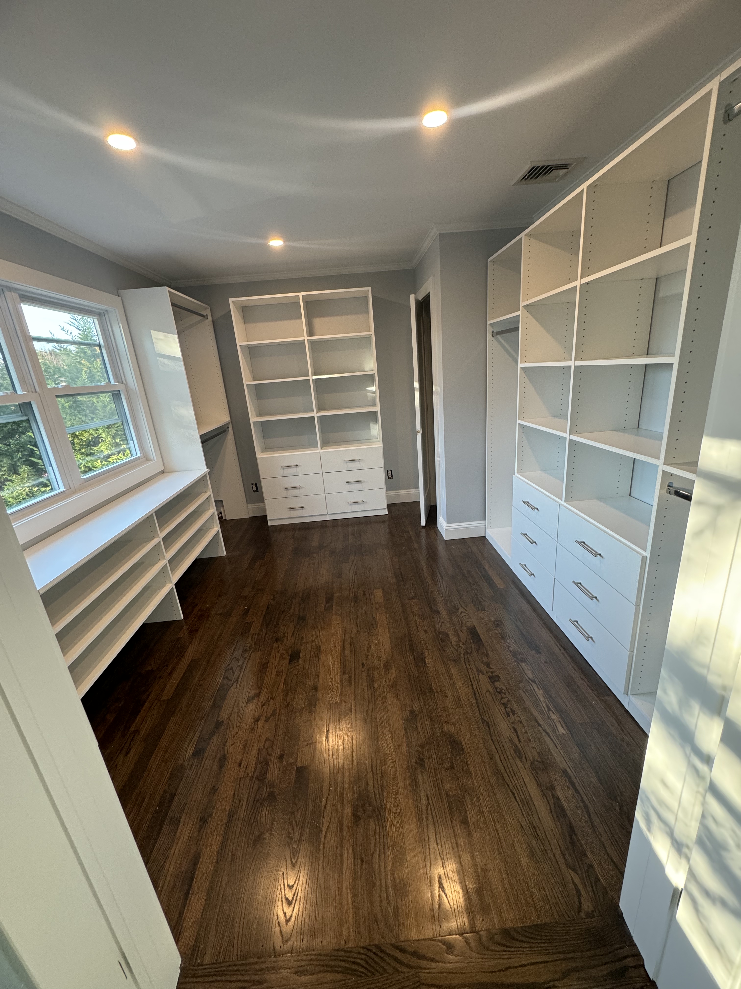 Big Walk-In custom closet project by Captain Chris's Closets on Long Island