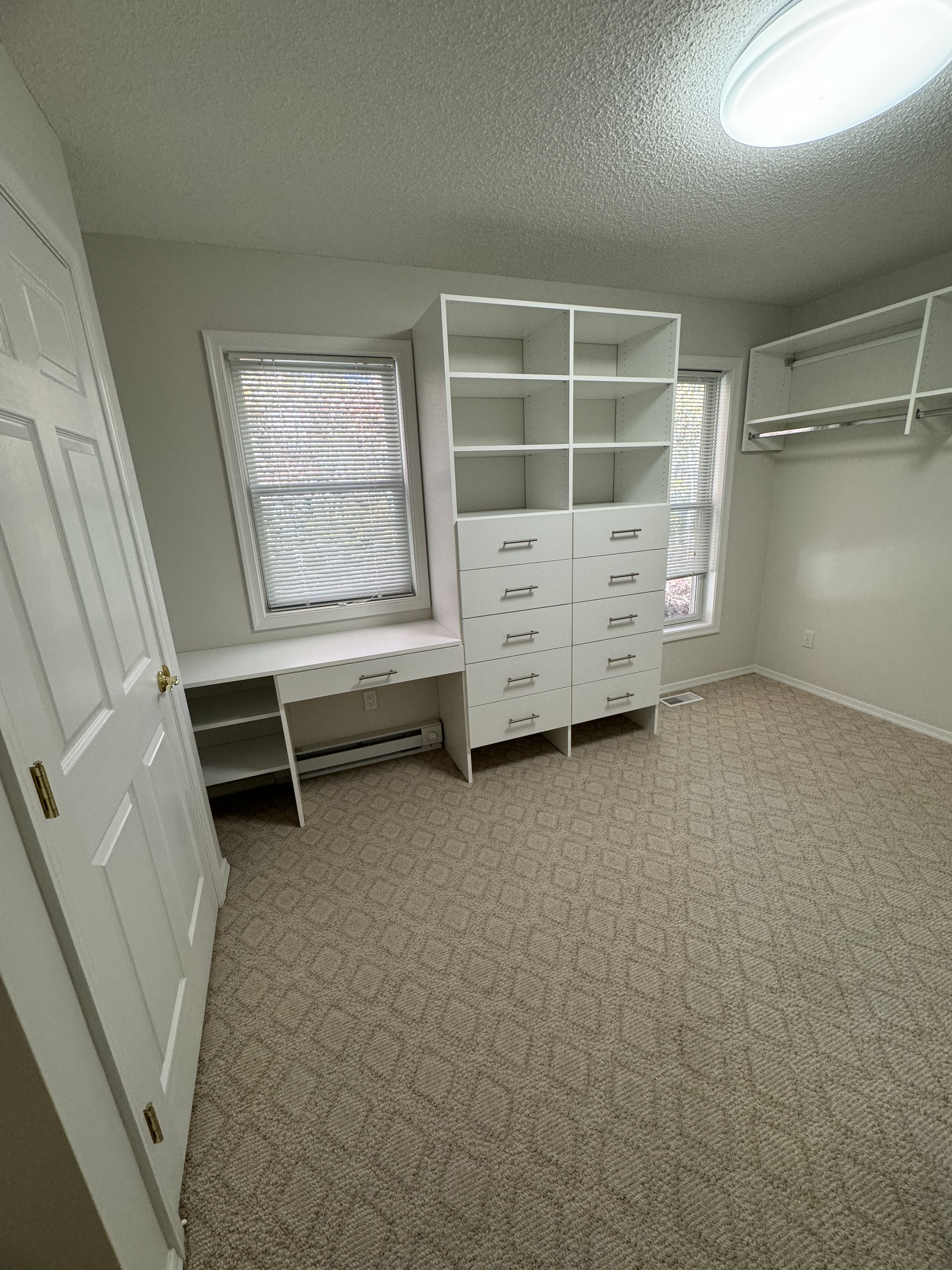 Big Walk-In custom closet project by Captain Chris's Closets on Long Island